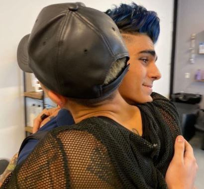 Kassius Lijah Marcil-Green with his friend Divinity Ray.